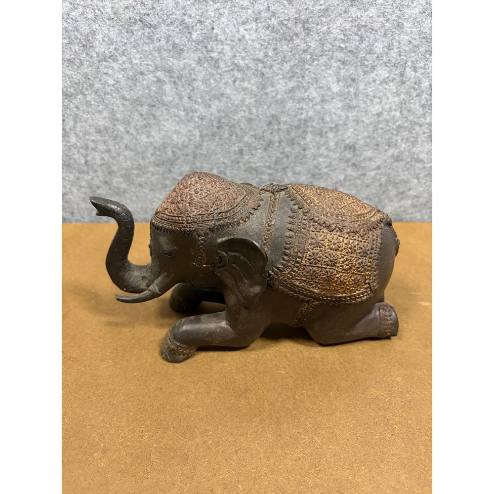 Vintage Ornate Kneeling Elephant Figurine Bronze Gold Tone Raised Trunk Decor